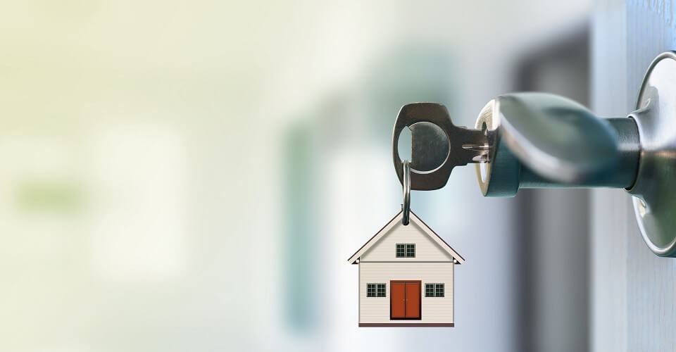 Keychain with a house
