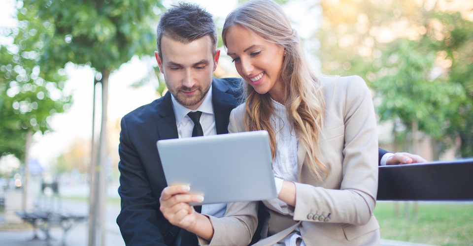 Business people with digital tablet
